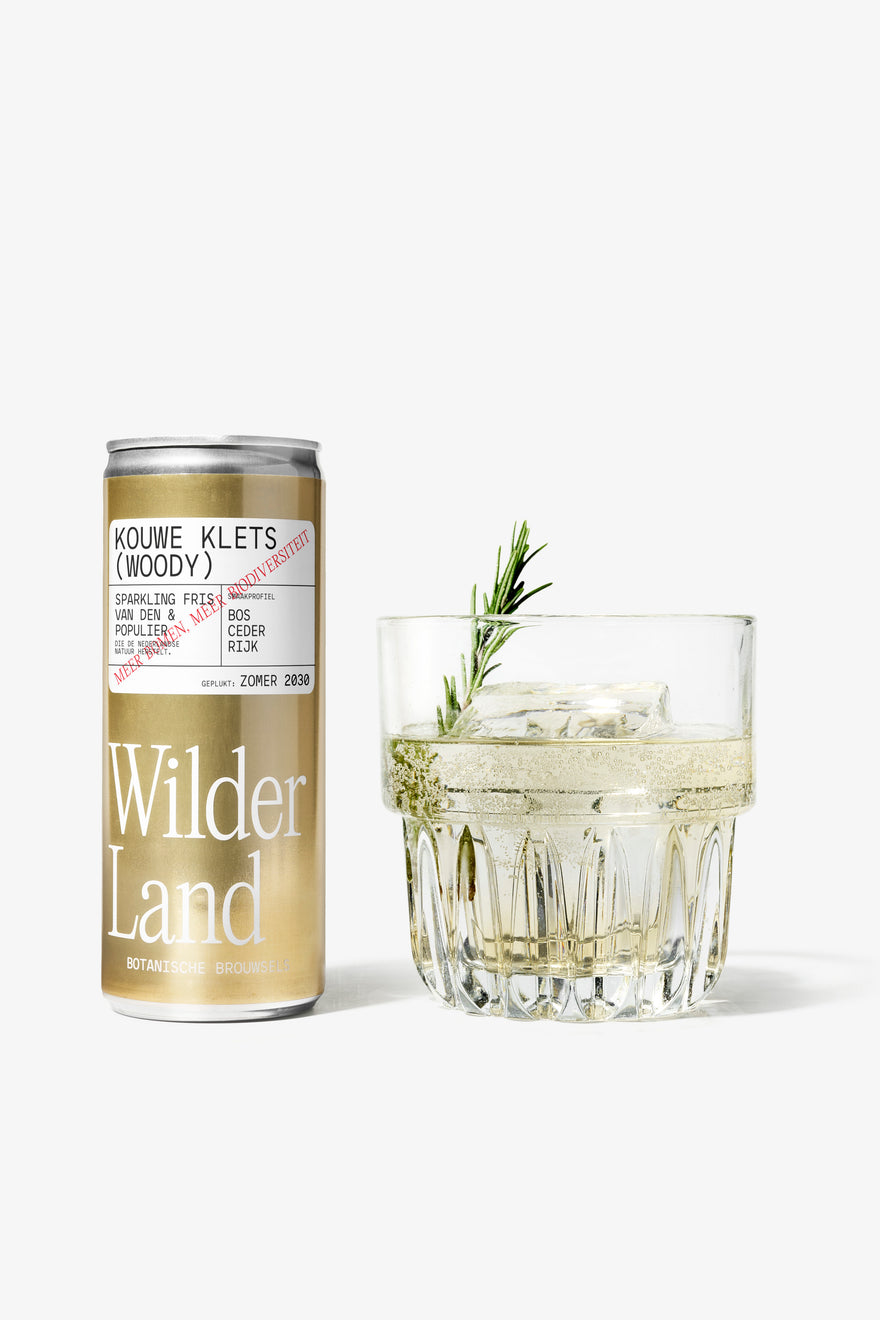 files/WILDERLAND_Packs_CAN_Kouwe_Klets_Woody_en_glas_42d06902-a9c0-431a-8792-f2d3836866cc.jpg